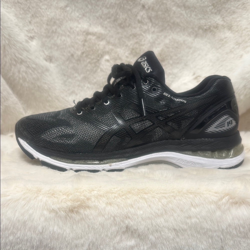 Asics ladies Gel Nimbus 19 Black and White Athletic Shoes with Mesh Ventilation